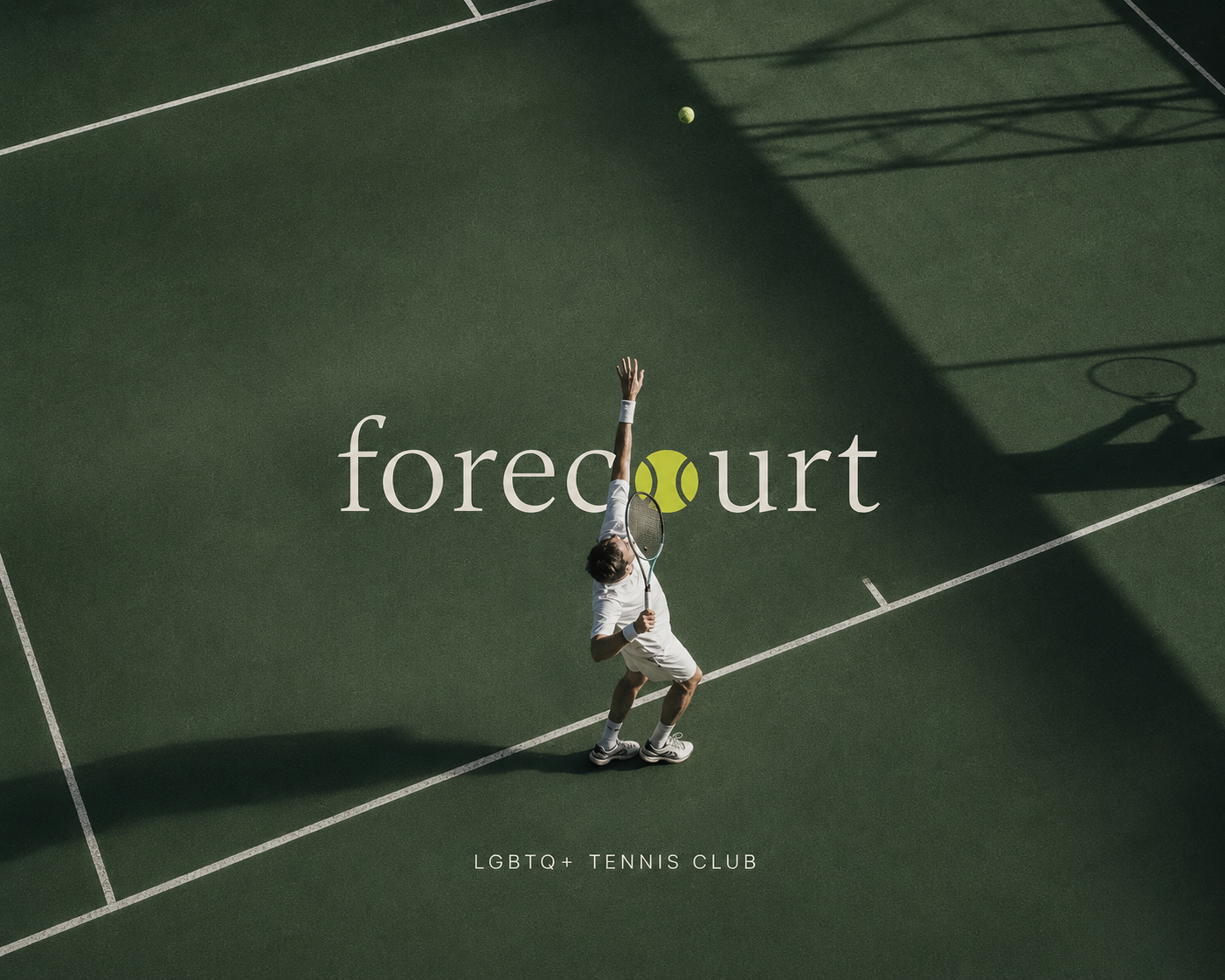 forecourt — a player serving on a green tennis court, seen from above